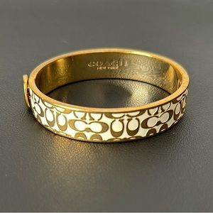 Coach gold bangles